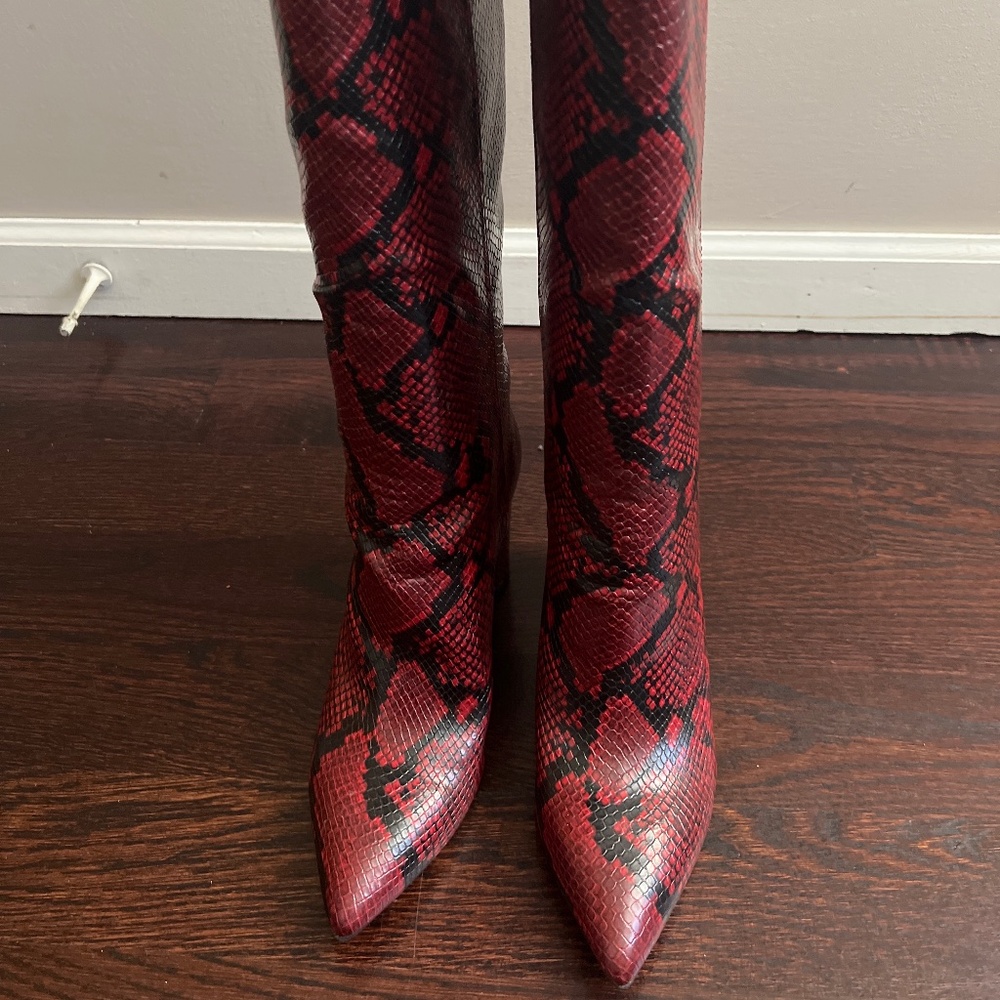 Snakeskin knee high boots
